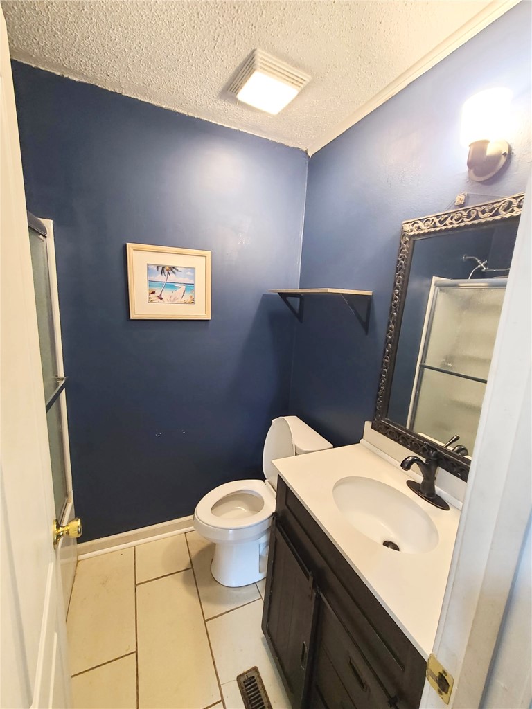 110 Ridgemont Court Greenwood, SC 29649 - Photo 10 of 14 A compact bathroom featuring a sleek vanity and a standing shower with privacy glass.