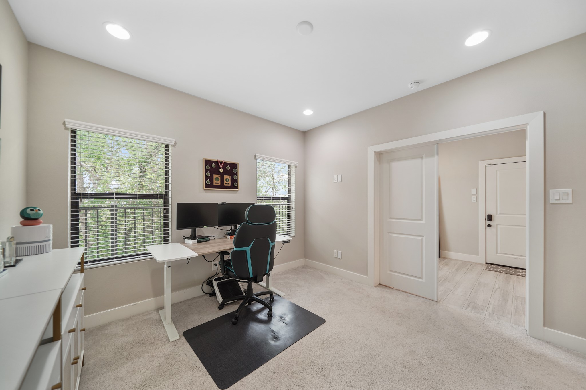 1824 Bonner Street Houston, TX 77007 - Photo 37 of 39 a view of a workspace with furniture and a window