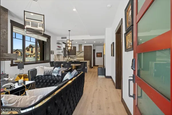 a kitchen with stainless steel appliances granite countertop a stove and a sink