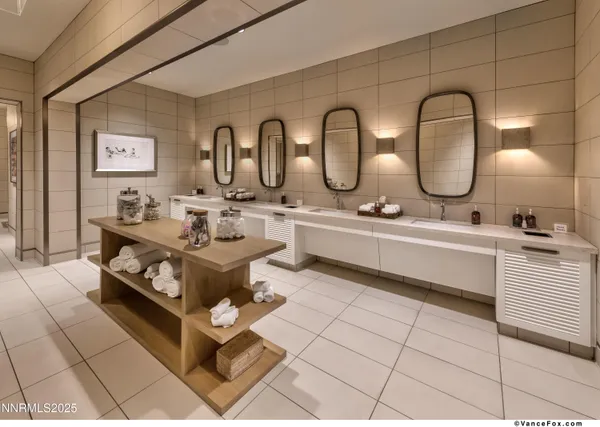 a bathroom with a double vanity sink mirror and bathtub