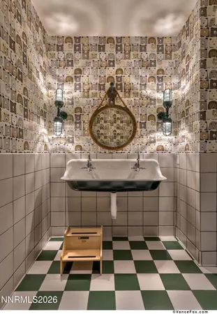 a view of a bathroom with a sink and a shower