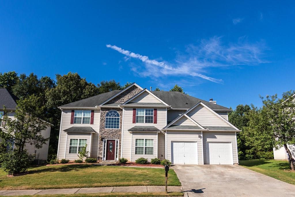 2817 Elkmont Ridge Southwest Atlanta, GA 30331 - Photo 1 of 1 Handsome traditional home with stone accent, double-wide driveway and 2-car garage with separate garage doors with automatic garage door openers.