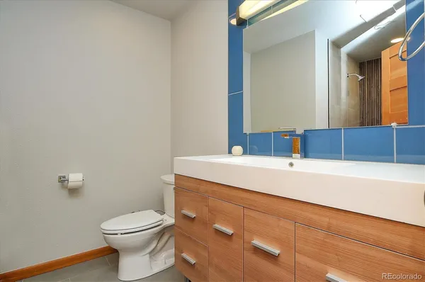 a bathroom with a sink and a toilet