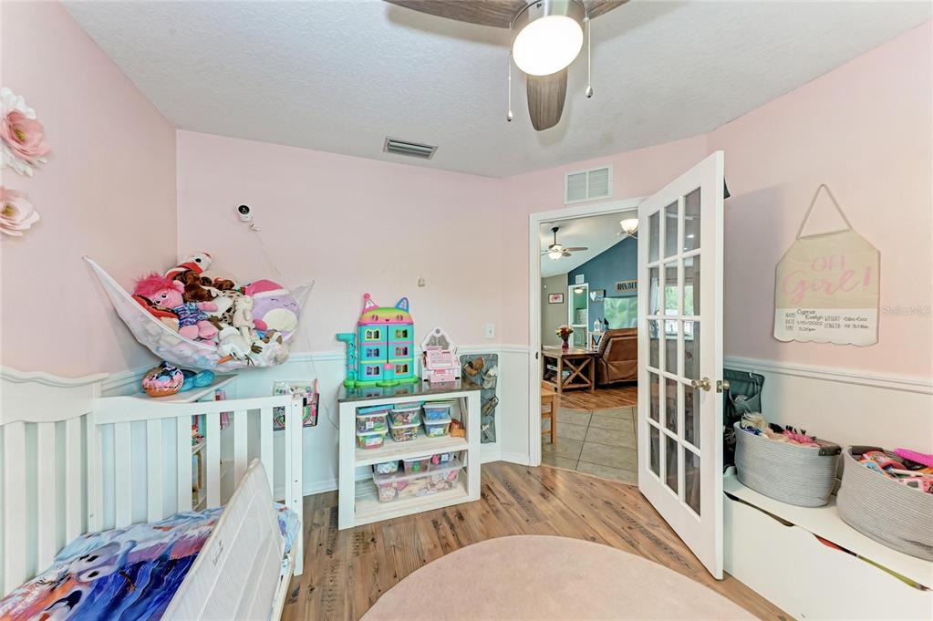 4608 Oliver Manor Drive Parrish, FL 34219 - Photo 22 of 45 a living room with lots of wooden furniture