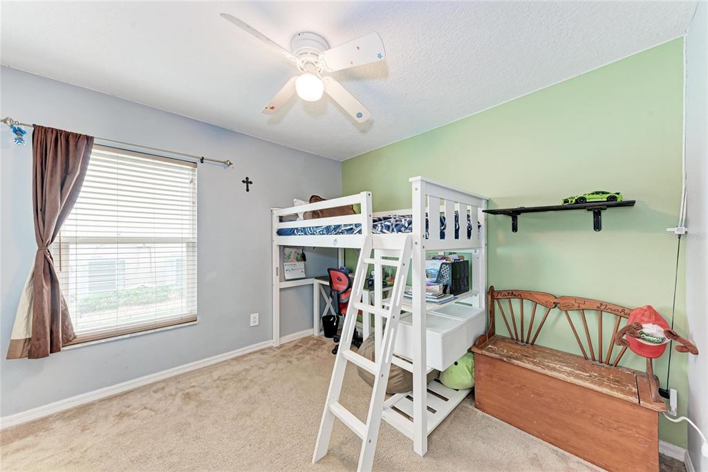 4608 Oliver Manor Drive Parrish, FL 34219 - Photo 23 of 45 a view of a livingroom with furniture and windows