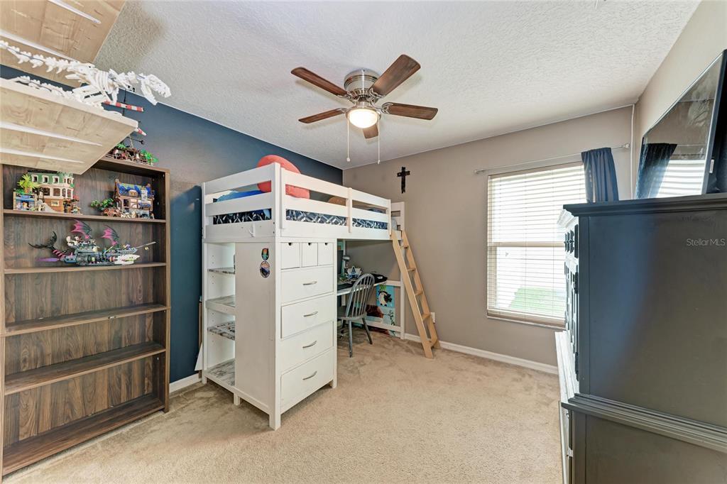 4608 Oliver Manor Drive Parrish, FL 34219 - Photo 25 of 45 a view of a livingroom with furniture and a window