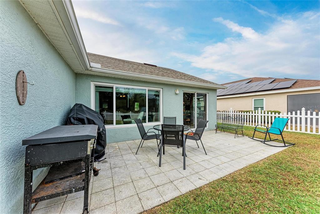 4608 Oliver Manor Drive Parrish, FL 34219 - Photo 30 of 45 a balcony with furniture and garden