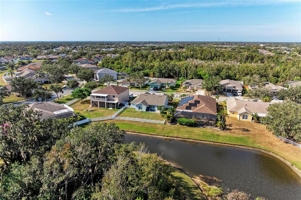 4608 Oliver Manor Drive Parrish, FL 34219 - Photo 33 of 45 an aerial view of residential houses with outdoor space and ocean view