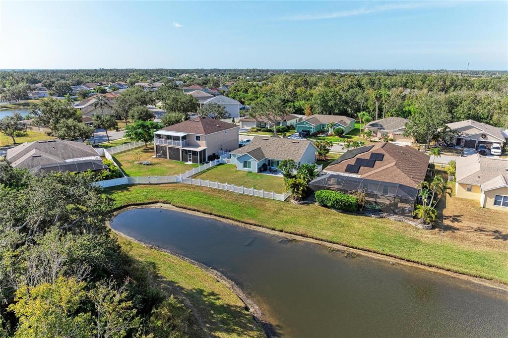 4608 Oliver Manor Drive Parrish, FL 34219 - Photo 34 of 45 an aerial view of a house with a swimming pool yard and outdoor seating