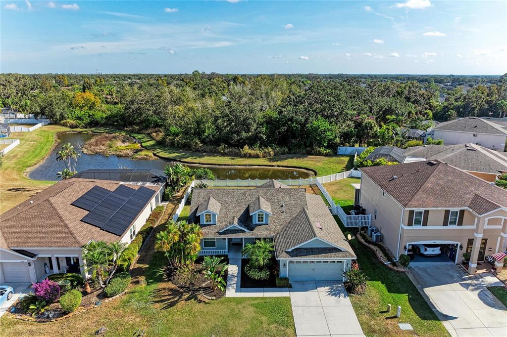 4608 Oliver Manor Drive Parrish, FL 34219 - Photo 43 of 45 an aerial view of a house a yard swimming pool and outdoor seating
