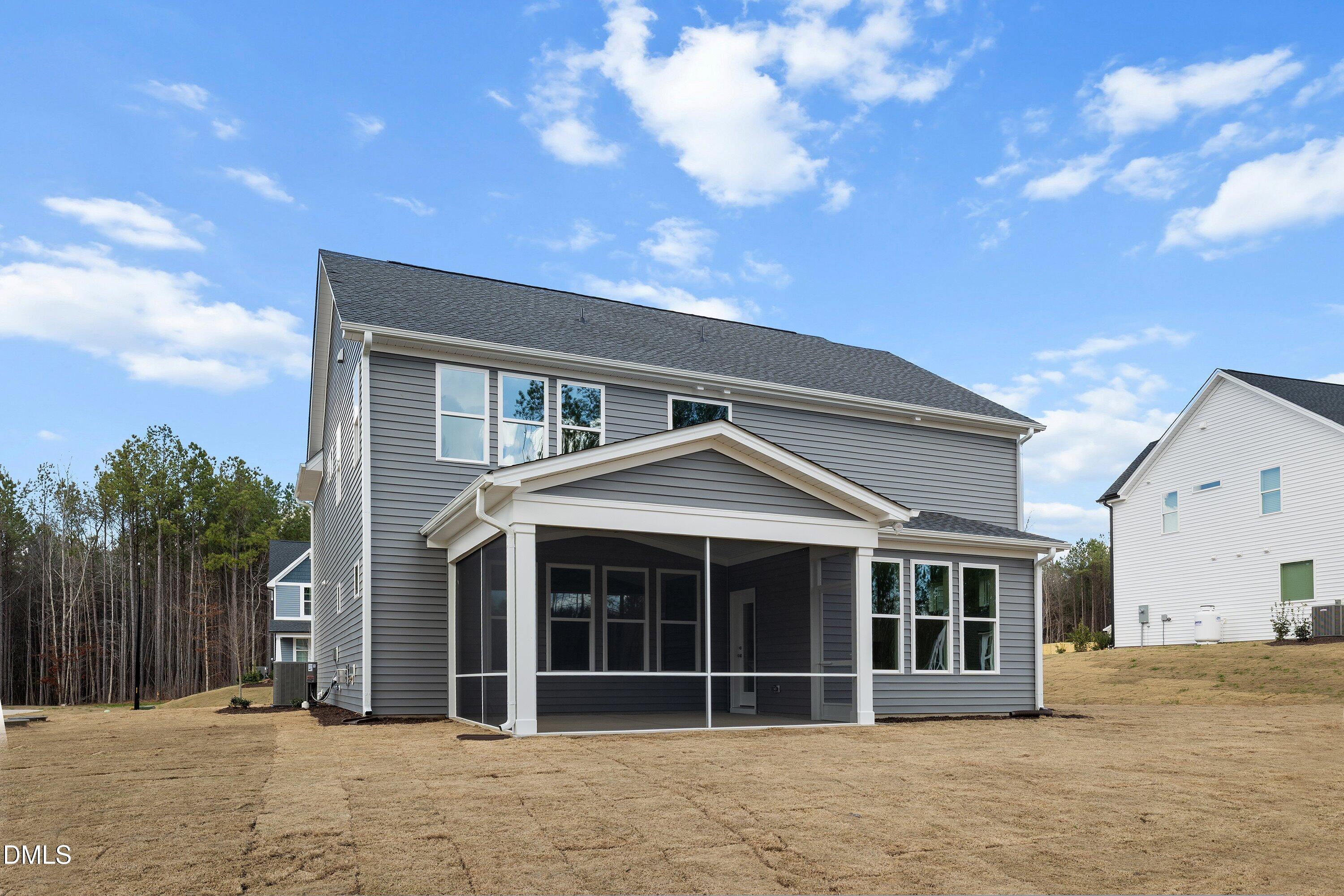 45 West Victoria Ridge Drive, Unit 32 Selma, NC 27576 - Photo 29 of 29 a front view of a house with a garden