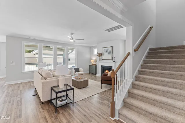 a living room with furniture and a table