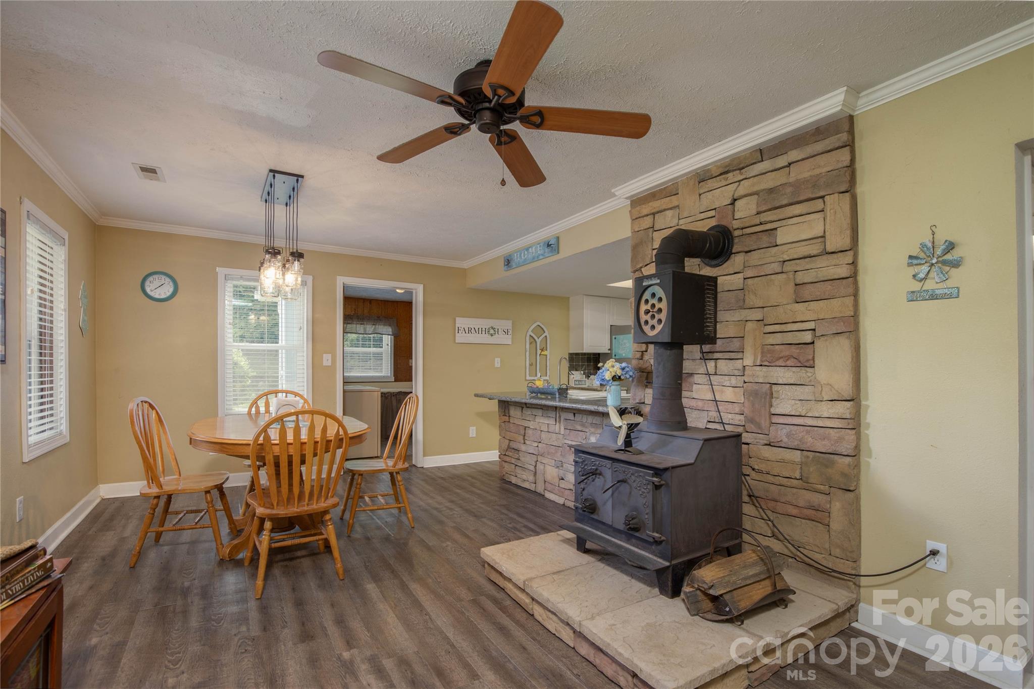 84 Sheets Farm Road Bakersville, NC 28705 - Photo 18 of 42 a workspace with wooden floor and furniture