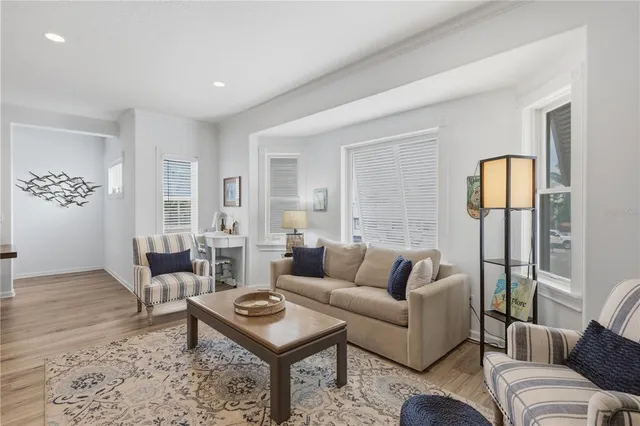 a living room with furniture and a table