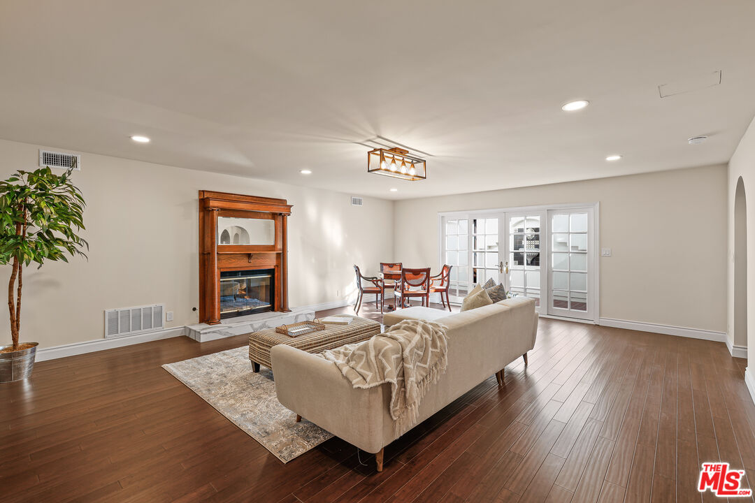 151 West Longden Avenue Arcadia, CA 91007 - Photo 16 of 46 a living room with furniture and a window