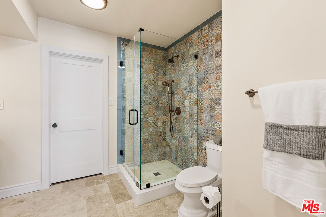 151 West Longden Avenue Arcadia, CA 91007 - Photo 26 of 46 a bathroom with a toilet and a shower