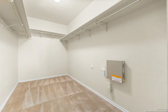 a view of a room with racks on the wall