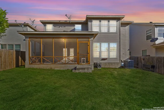 a front view of a house with a garden and porch