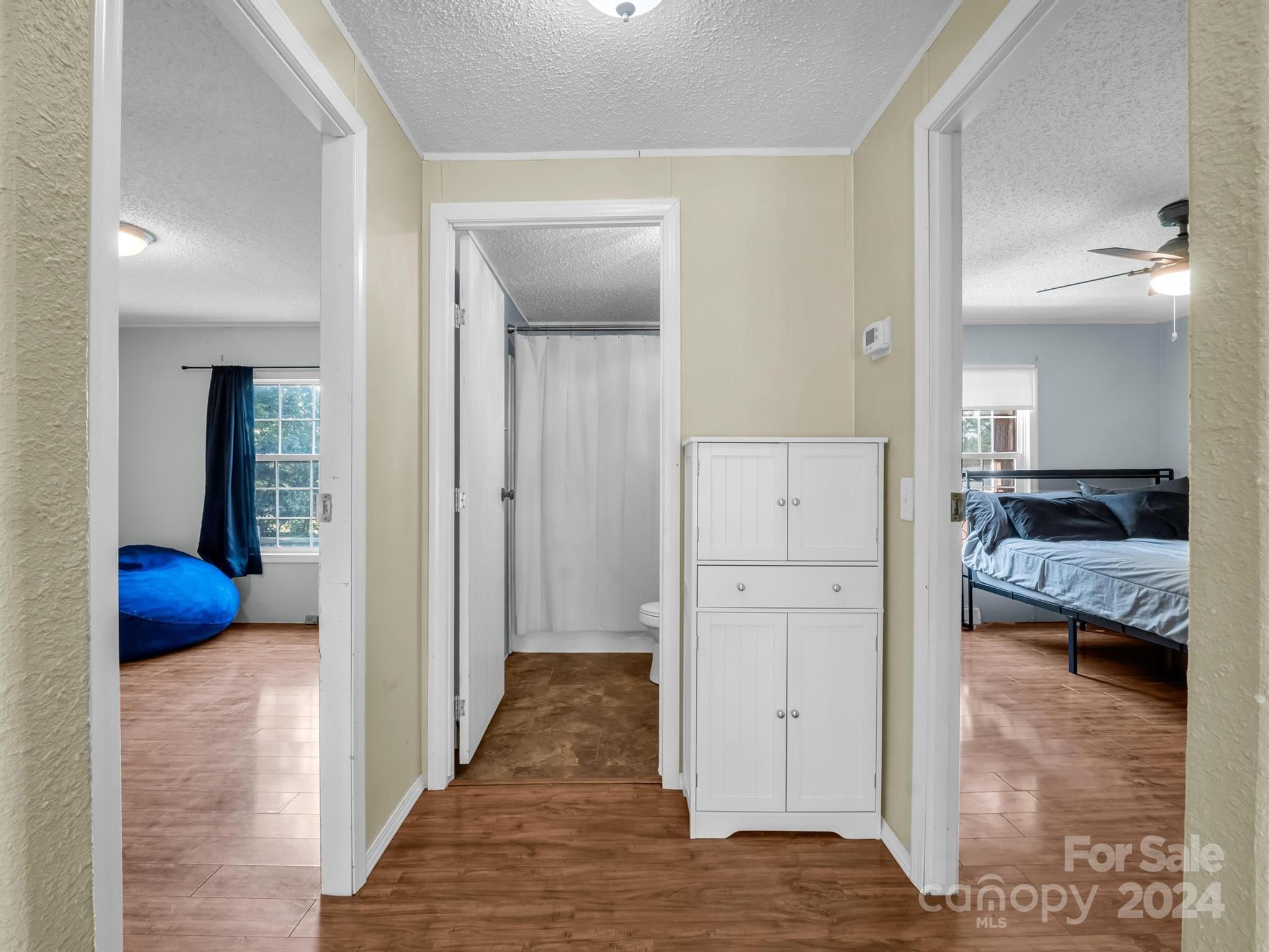 293 Bane Road Mills River, NC 28759 - Photo 23 of 48 a view of a bedroom from the hallway