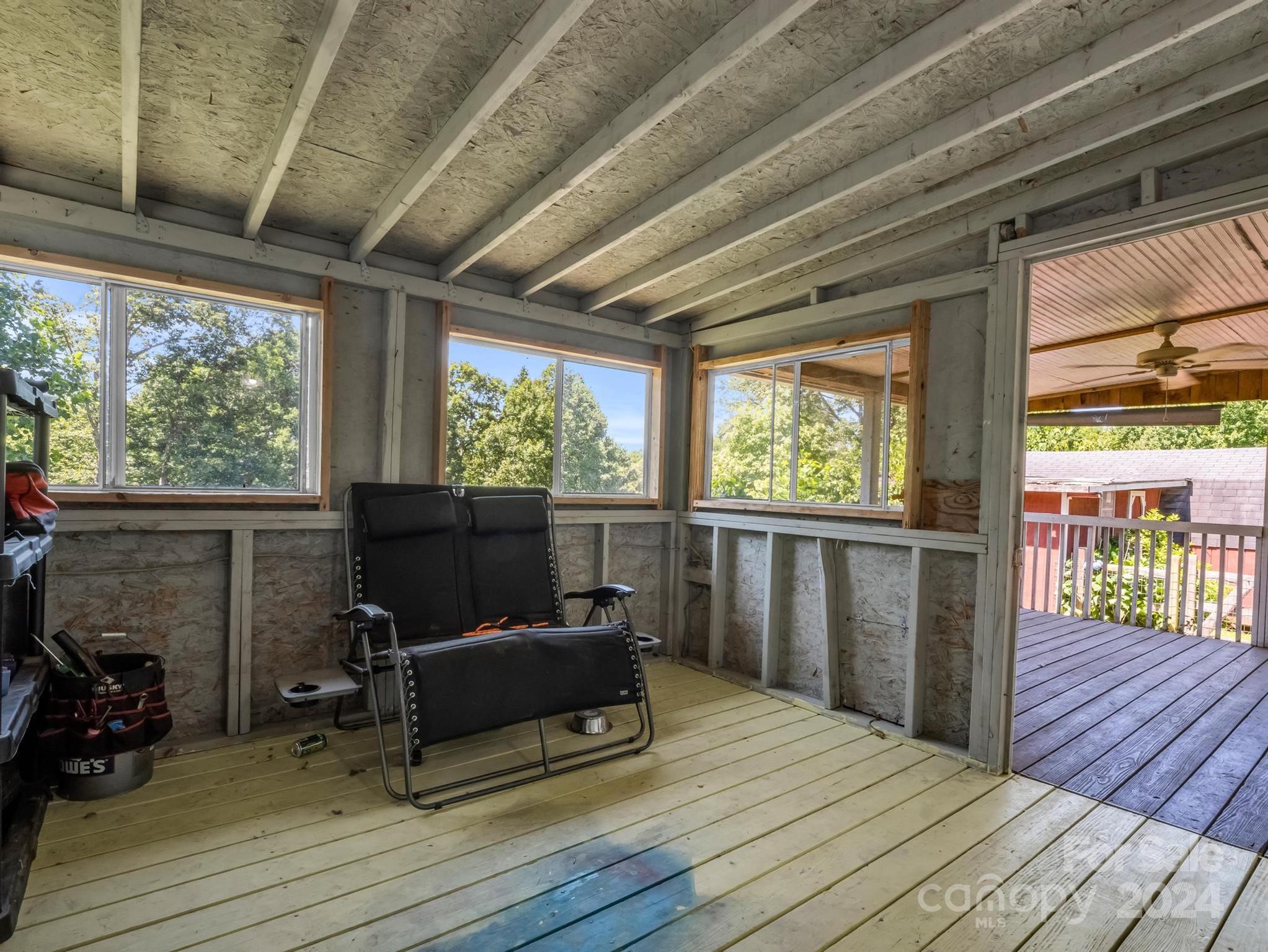 293 Bane Road Mills River, NC 28759 - Photo 31 of 48 a view of a patio with wooden floor