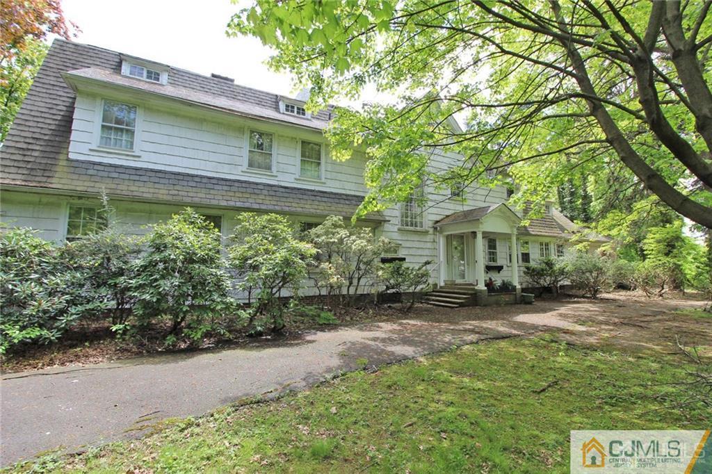 346 New Dover Road Colonia, NJ 07067 - Photo 1 of 24 a view of a house with a yard