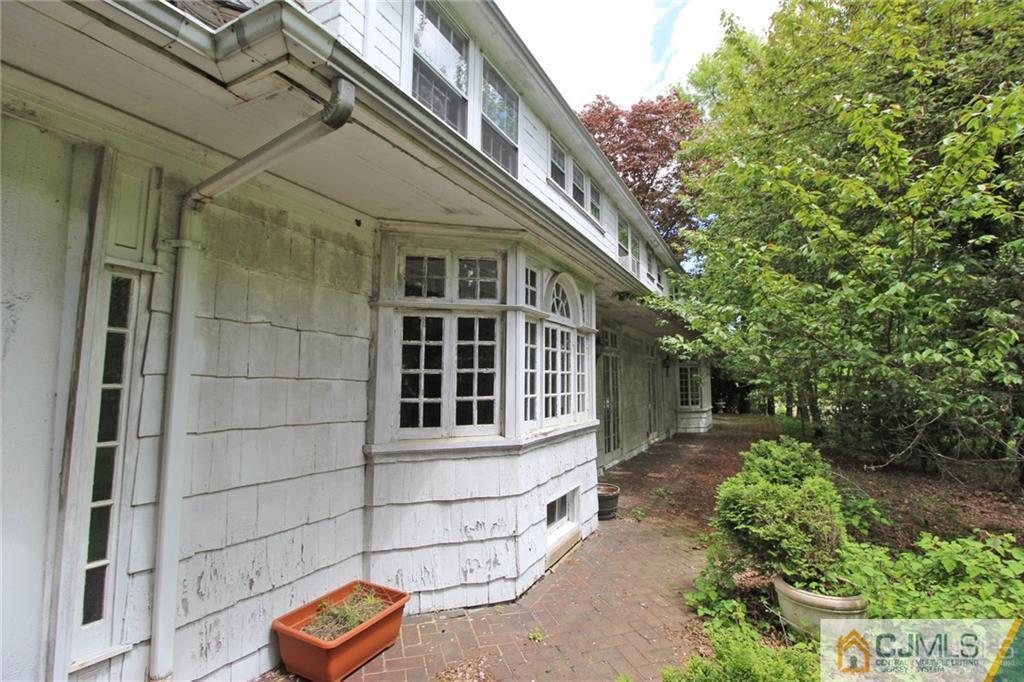 346 New Dover Road Colonia, NJ 07067 - Photo 24 of 24 a view of a house with a small yard and potted plants