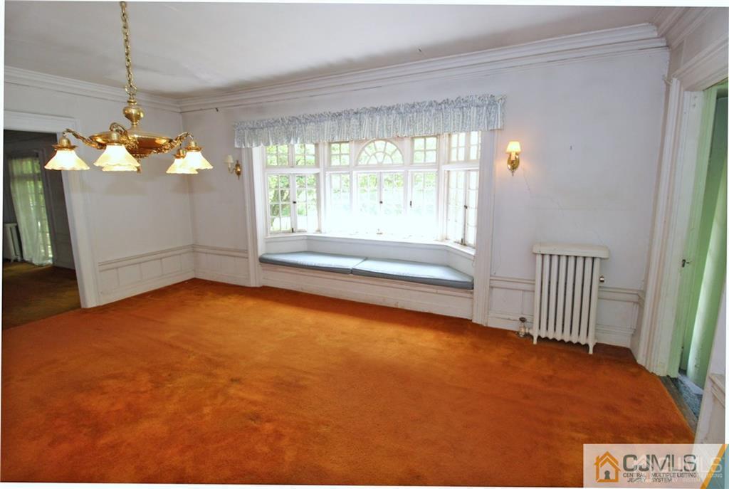 346 New Dover Road Colonia, NJ 07067 - Photo 5 of 24 a view of a livingroom with a window