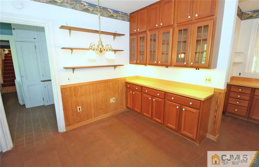 346 New Dover Road Colonia, NJ 07067 - Photo 7 of 24 a kitchen with stainless steel appliances granite countertop a sink and a cabinets