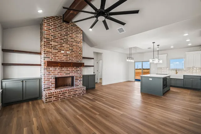 a view of kitchen and kitchen with sink