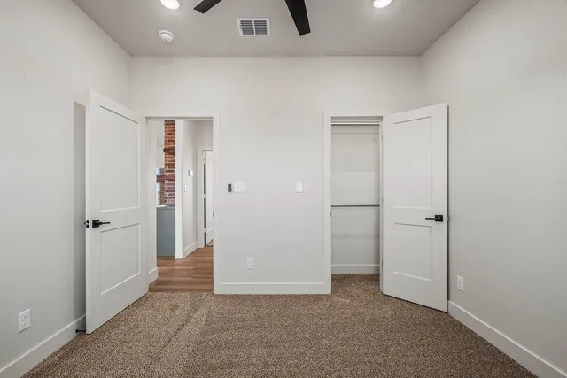 a bathroom with a sink a toilet and bathtub