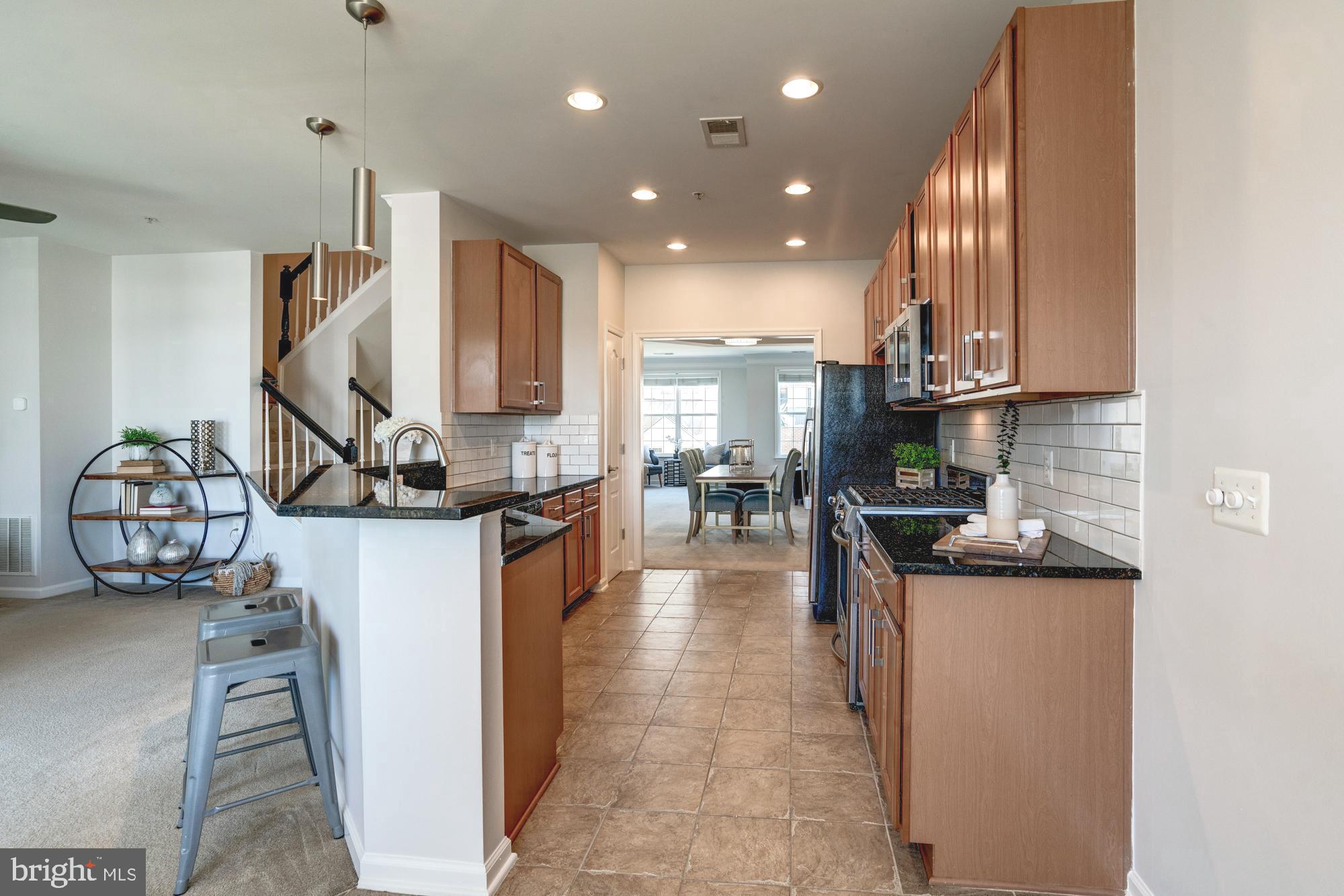 11706 Leesborough Circle, Unit 11706 Silver Spring, MD 20902 - Photo 19 of 39 Kitchen fully equipped with modern conveniences