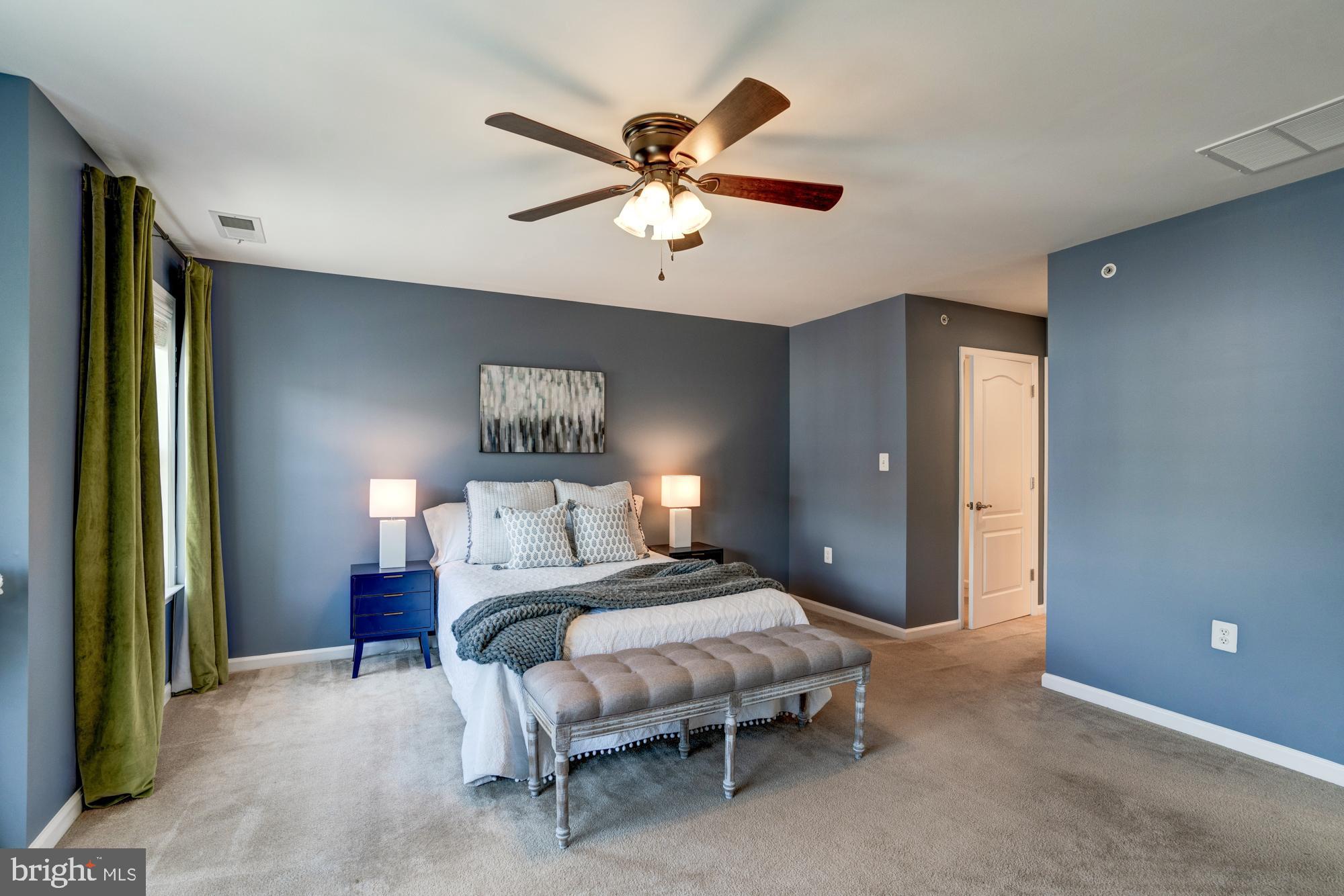 11706 Leesborough Circle, Unit 11706 Silver Spring, MD 20902 - Photo 28 of 39 King size bed and room for lounging