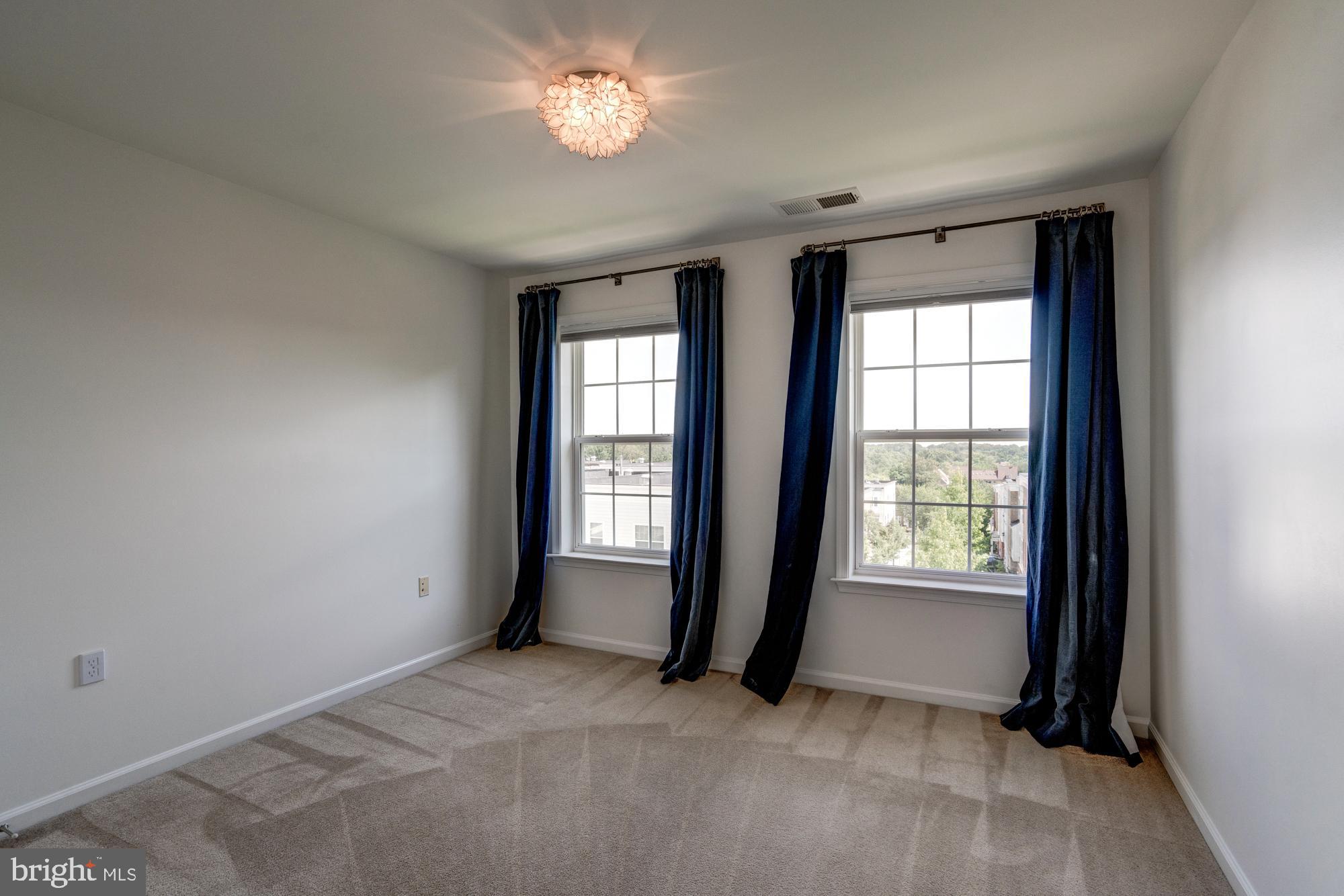 11706 Leesborough Circle, Unit 11706 Silver Spring, MD 20902 - Photo 33 of 39 Bedroom two with large windows