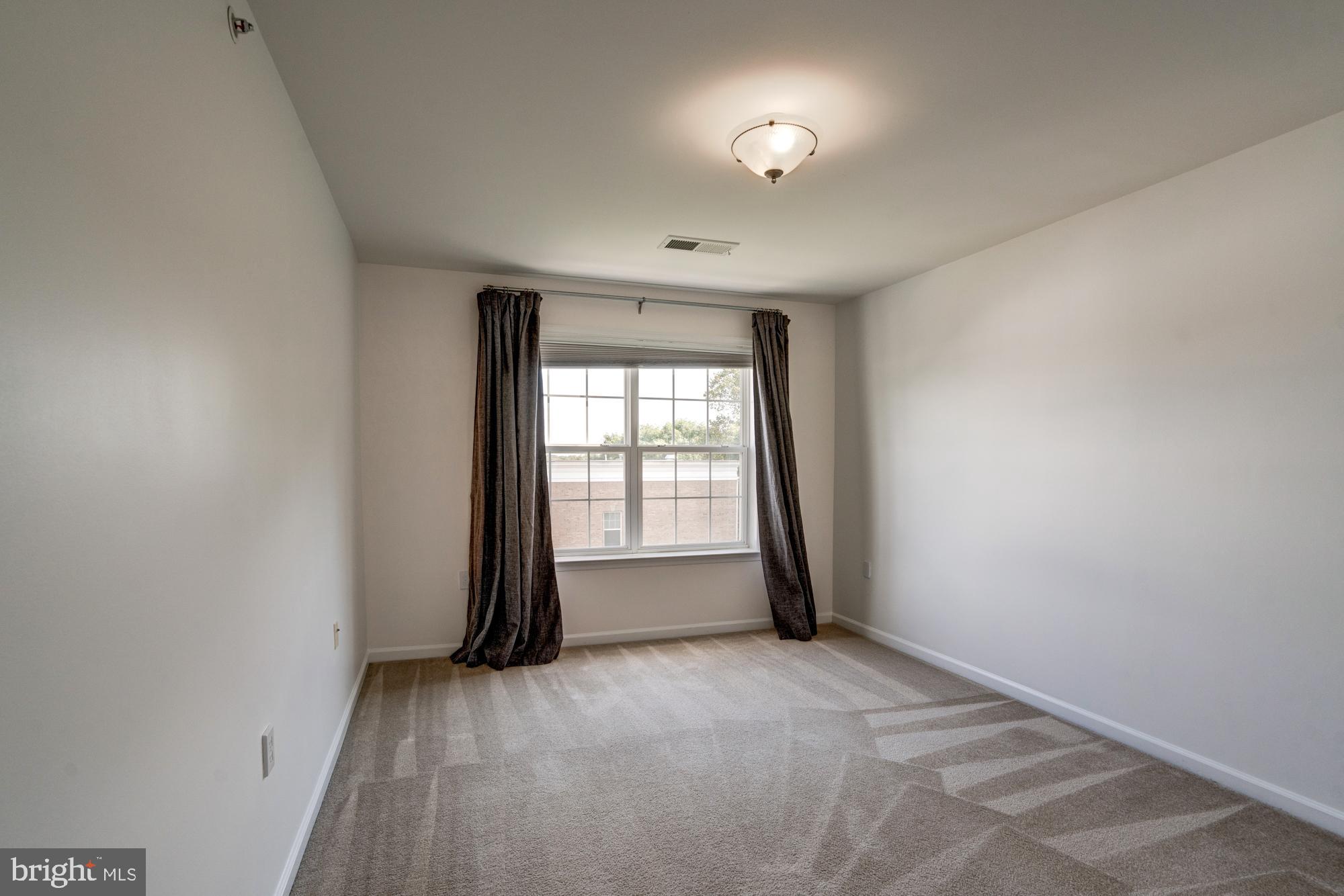 11706 Leesborough Circle, Unit 11706 Silver Spring, MD 20902 - Photo 34 of 39 Bedroom three with more large windows
