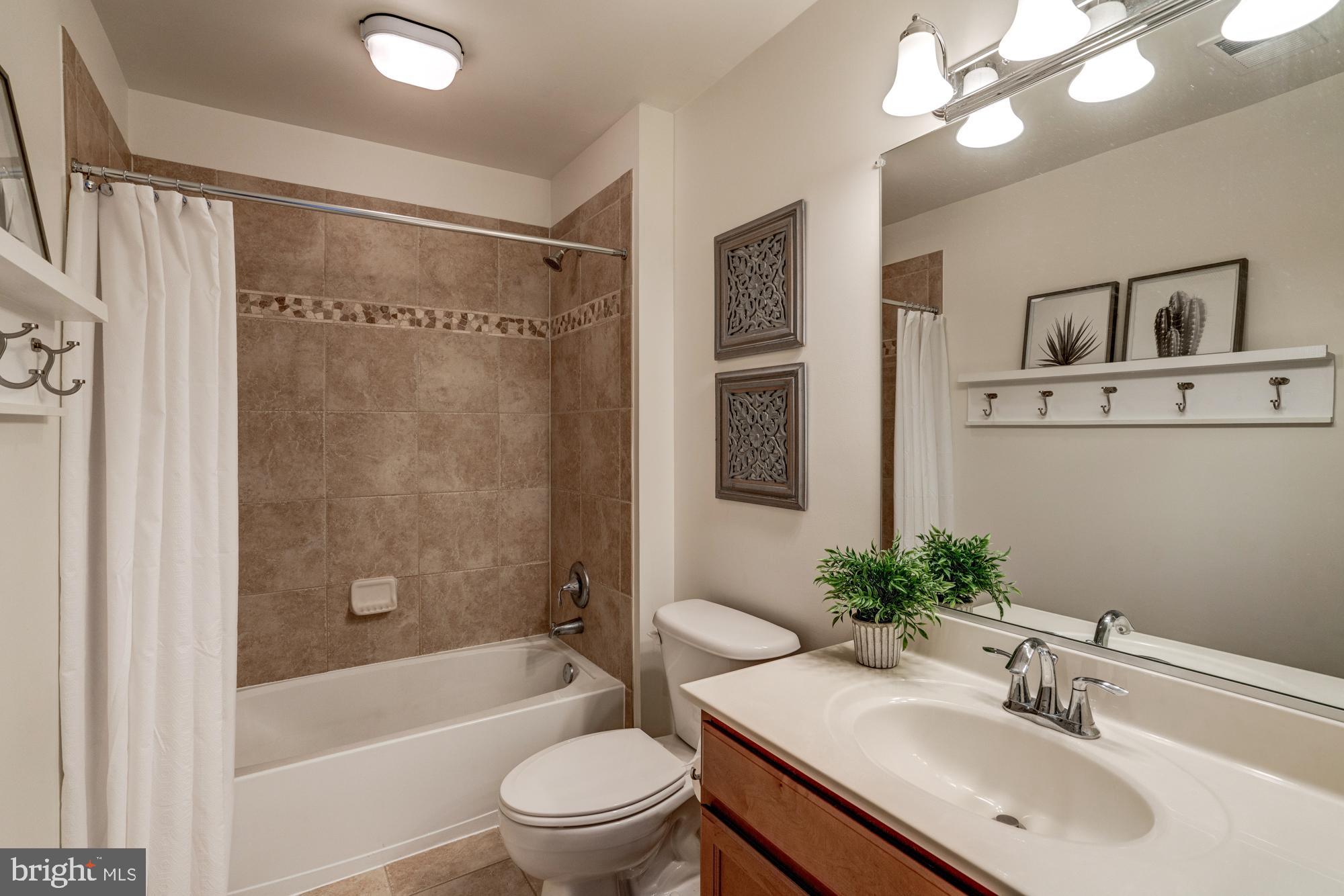 11706 Leesborough Circle, Unit 11706 Silver Spring, MD 20902 - Photo 36 of 39 Bathroom with updated vanity