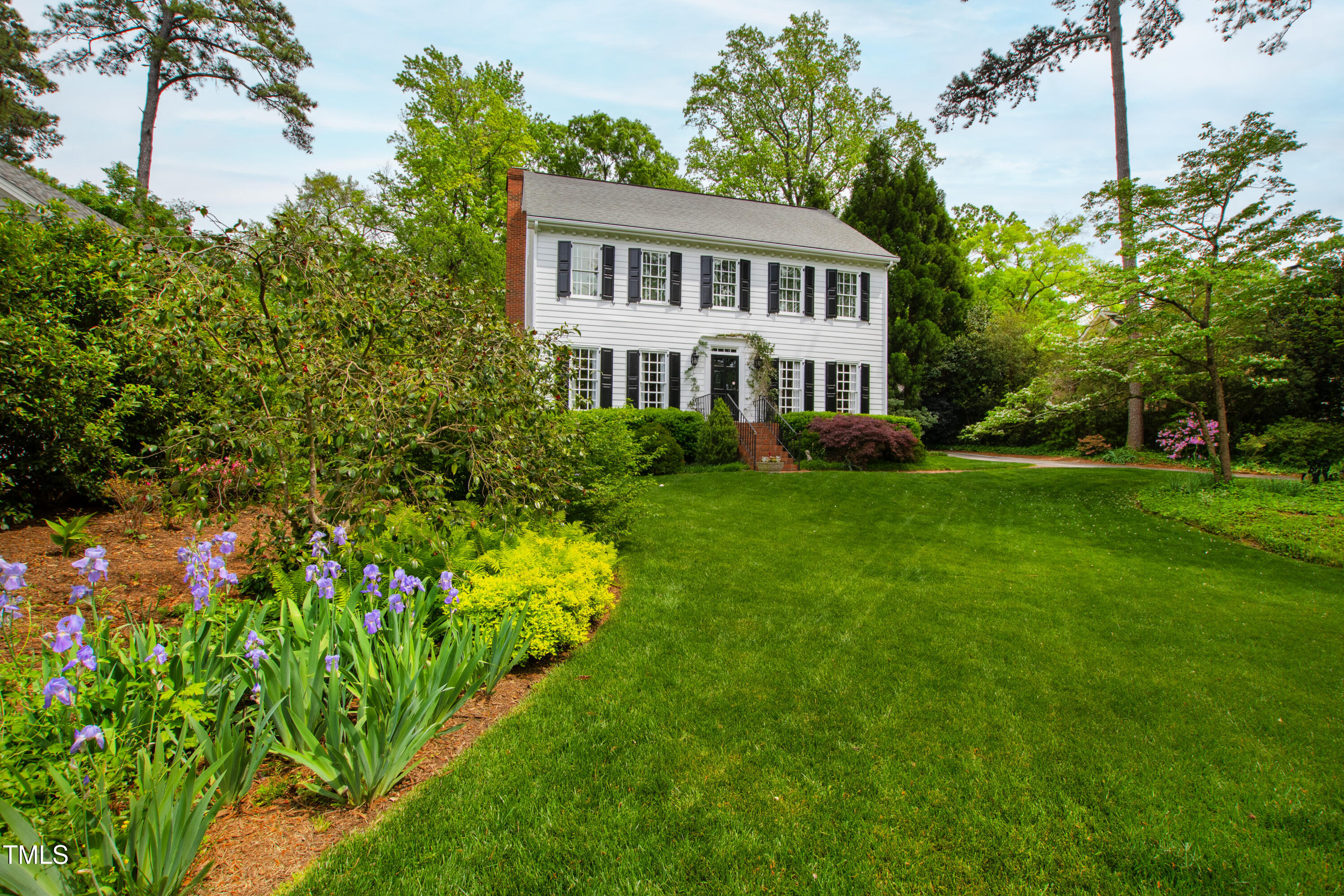 a house view with a garden space