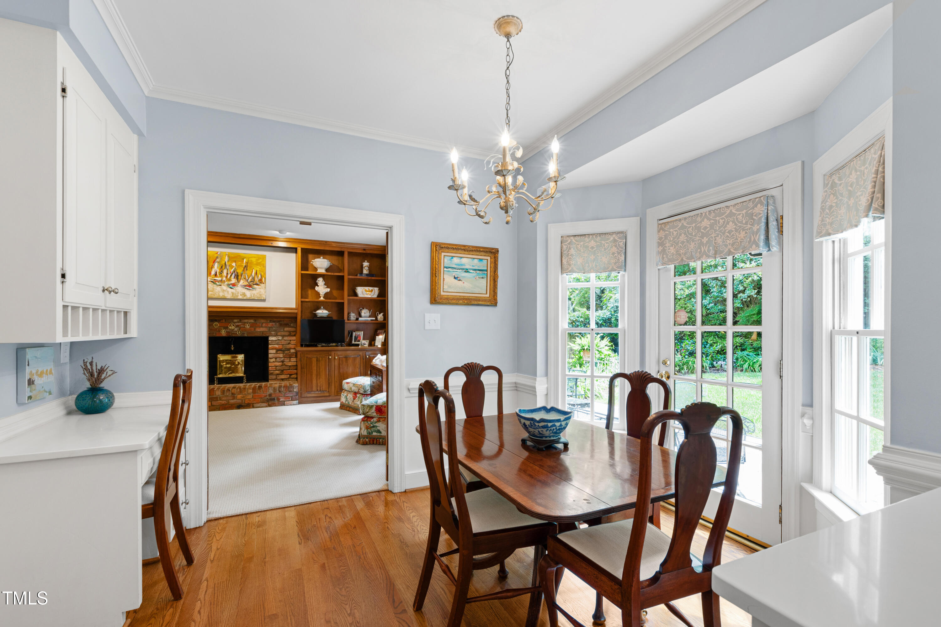1904 Victoria Road Raleigh, NC 27608 - Photo 18 of 63 a view of a dining room with furniture window and outside view
