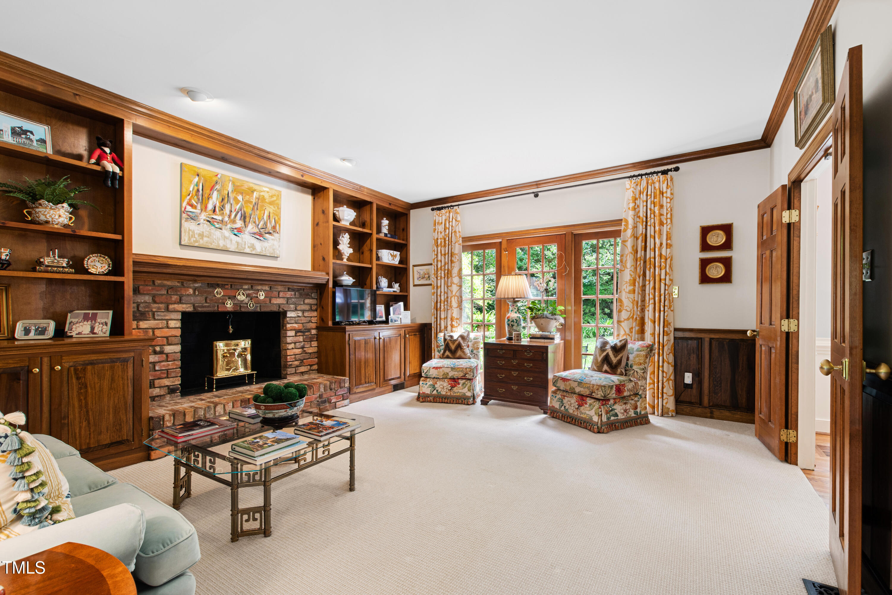 1904 Victoria Road Raleigh, NC 27608 - Photo 21 of 63 a living room with furniture large window and a fireplace