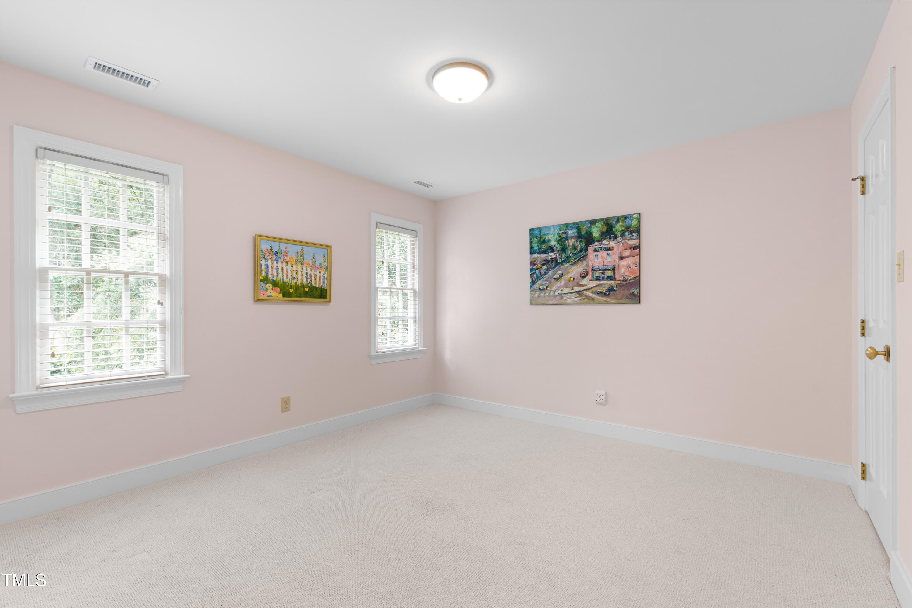 1904 Victoria Road Raleigh, NC 27608 - Photo 47 of 63 an empty room with windows