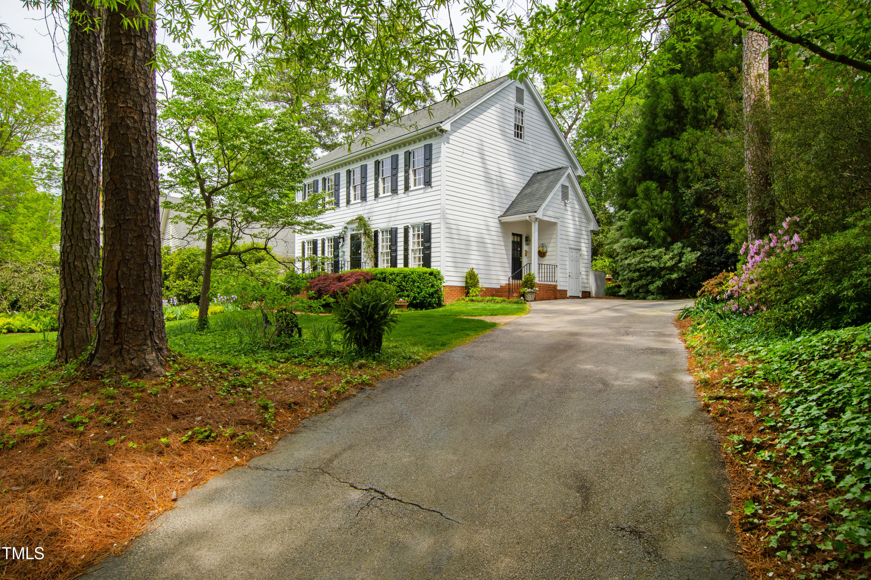1904 Victoria Road Raleigh, NC 27608 - Photo 51 of 63 front view of a house with a yard