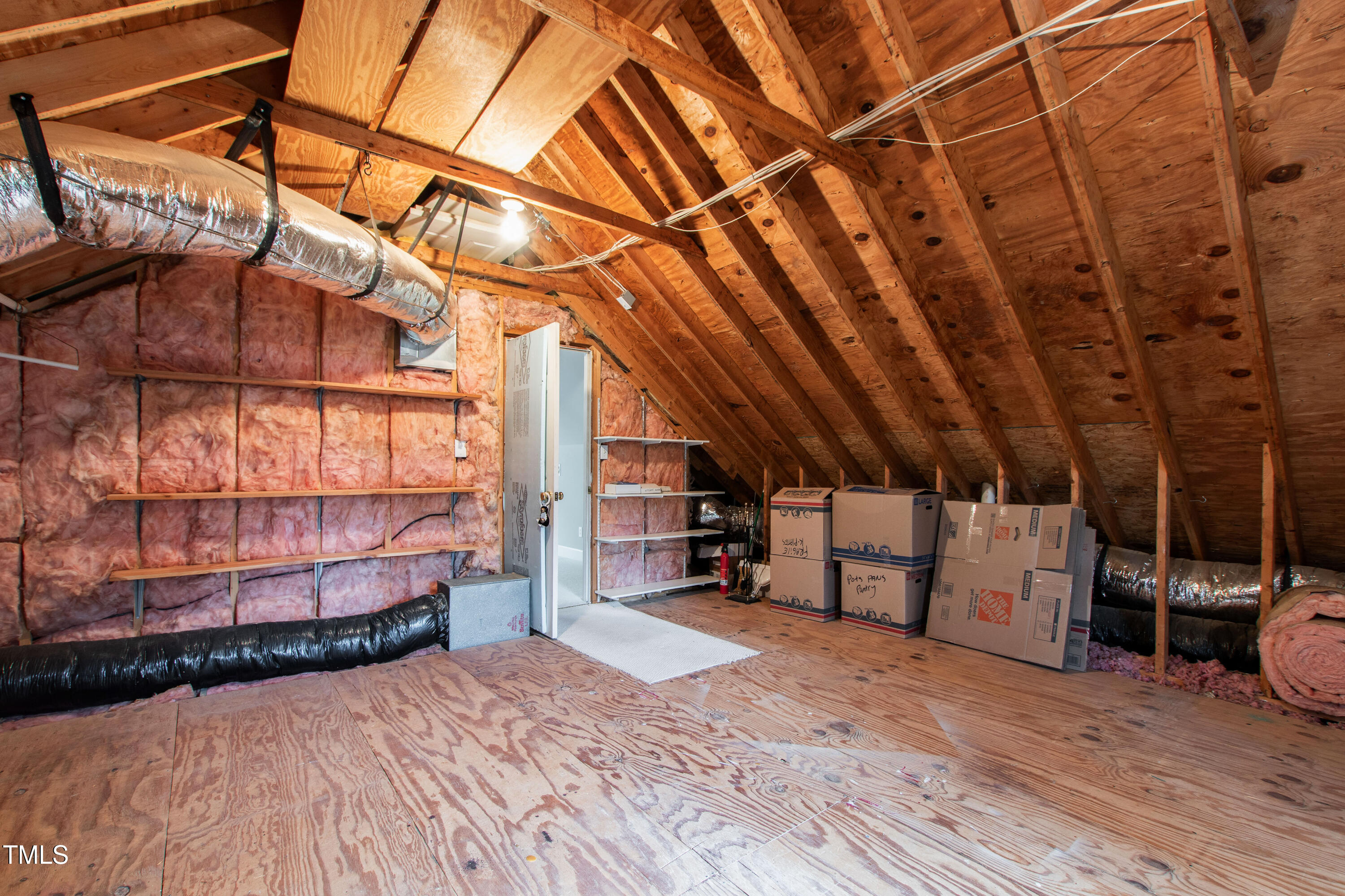 1904 Victoria Road Raleigh, NC 27608 - Photo 62 of 63 a view of a room with wooden walls