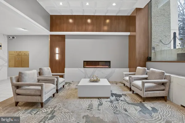 a living room with furniture and a couch