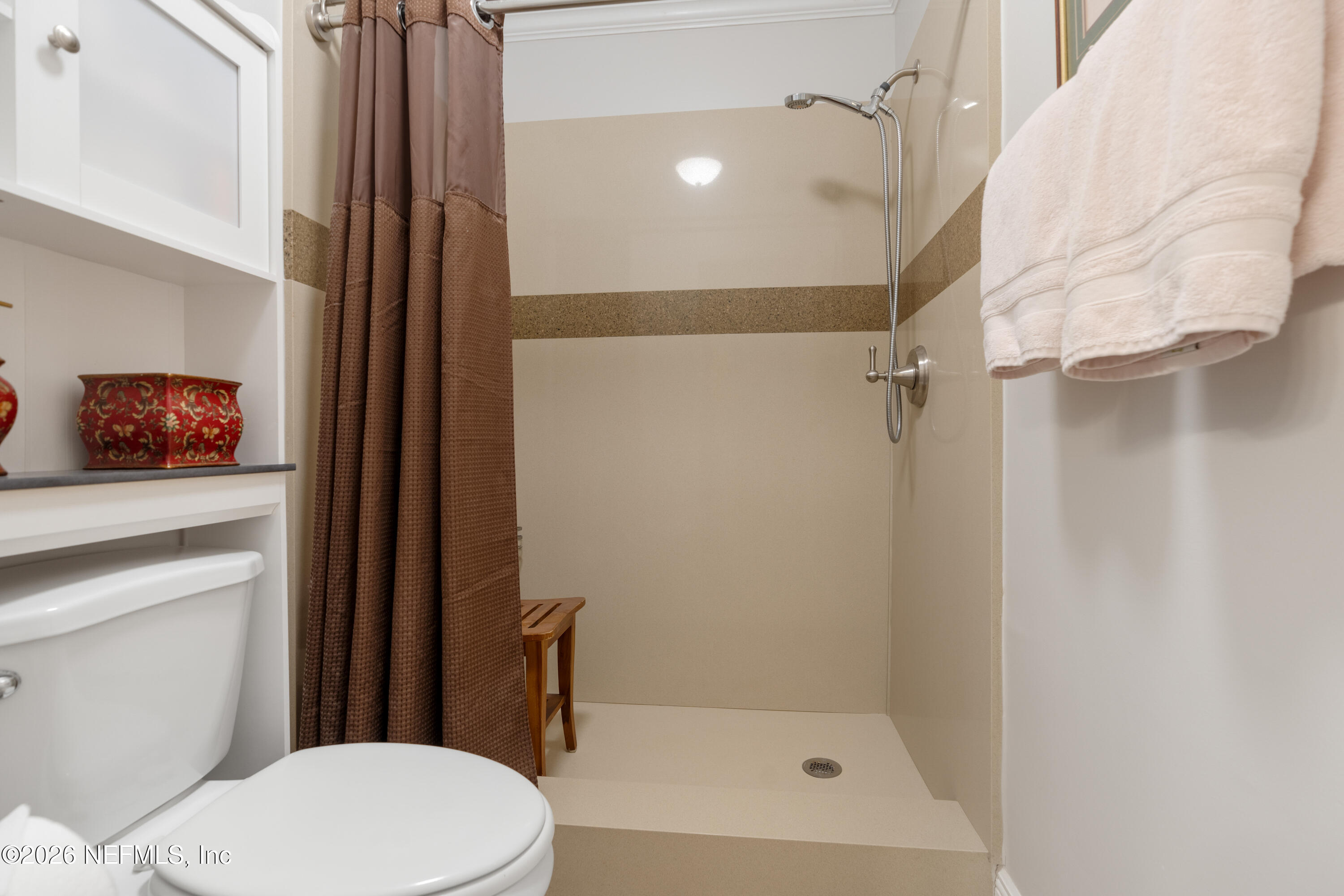 204 Gerado Street, Unit 3 St. Augustine, FL 32080 - Photo 20 of 31 a bathroom with a toilet and a shower