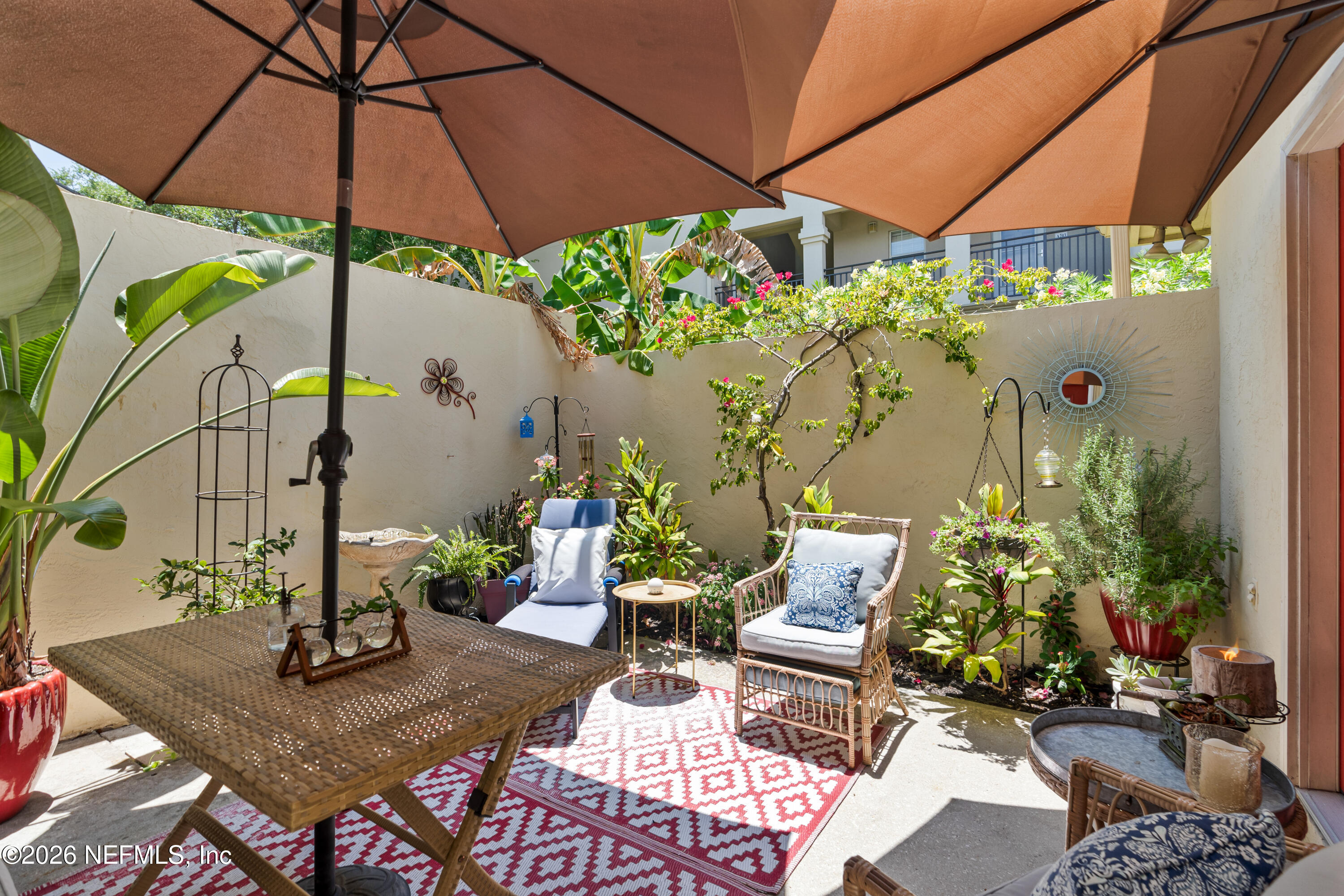 204 Gerado Street, Unit 3 St. Augustine, FL 32080 - Photo 27 of 31 a view of an outdoor dining space with a patio