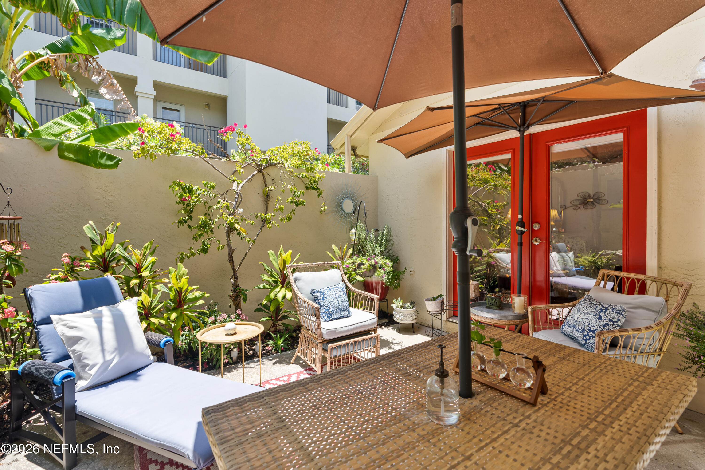 204 Gerado Street, Unit 3 St. Augustine, FL 32080 - Photo 28 of 31 a outdoor living space with furniture and garden view