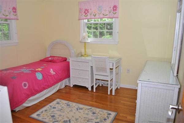 352 Liberty Square Road Boxborough, MA 01719 - Photo 14 of 16 a bed room with a bed window and a chair