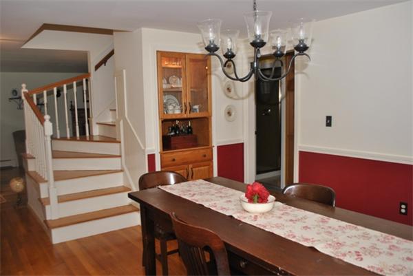 352 Liberty Square Road Boxborough, MA 01719 - Photo 8 of 16 a view of a dining room with furniture