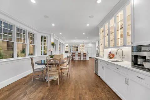a view of a kitchen and dining room