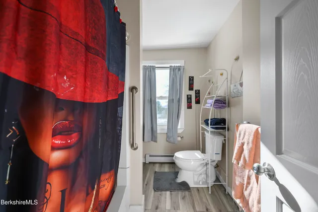 a bathroom with a sink and toilet