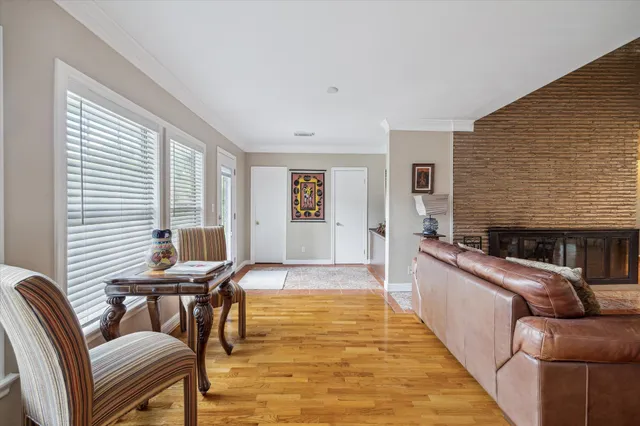 a view of a livingroom with furniture and a fireplace